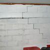 A buckling foundation wall in a Milford home.