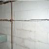 Severe foundation damage from a long crack in a bucking wall of a Brookhaven  home.