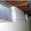 A foundation showing severe inward buckling along the windows in a Edgemoor  home.