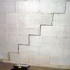 A diagonal stair step crack along the foundation wall of a Kennett Square home