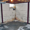 Rusted, corroded i-beams found with a failing foundation in a Harrington home.