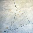foundation heaving cracks in a slab floor in Newark