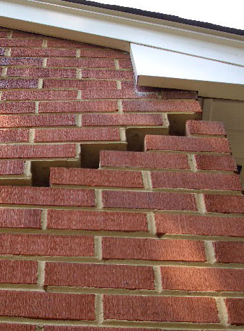 photo of a rotating foundation wall with cracks in Swarthmore
