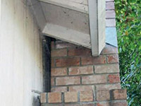 A chimney leaning away from the home on a Milford foundation