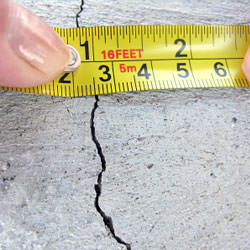 A crack in a poured concrete wall that's showing a normal crack during curing in Camden 
