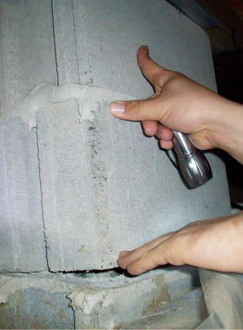 a completely failing concrete crawl space support pillar in Camden 