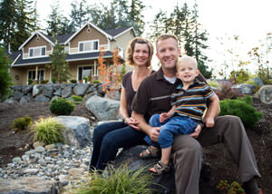 A happy family outside a home with a repaired foundation in Middletown